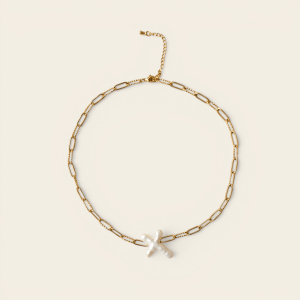 Collier Verika Bijoux Calypso à croix de nacre et perle de culture sur chaîne dorée