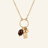 Collier Aubépine, anneau ciselé, perle d'œil de taureau et breloques dorées - Verika Bijoux