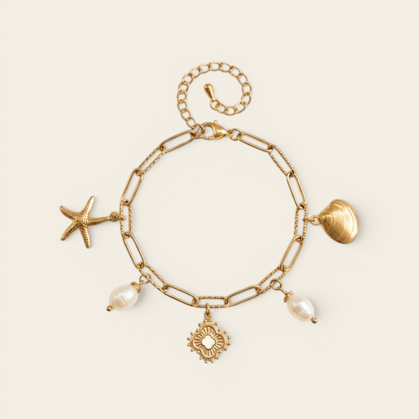 Bracelet Verika Bijoux Cybèle doré à breloques étoile de mer, coquillage et perles