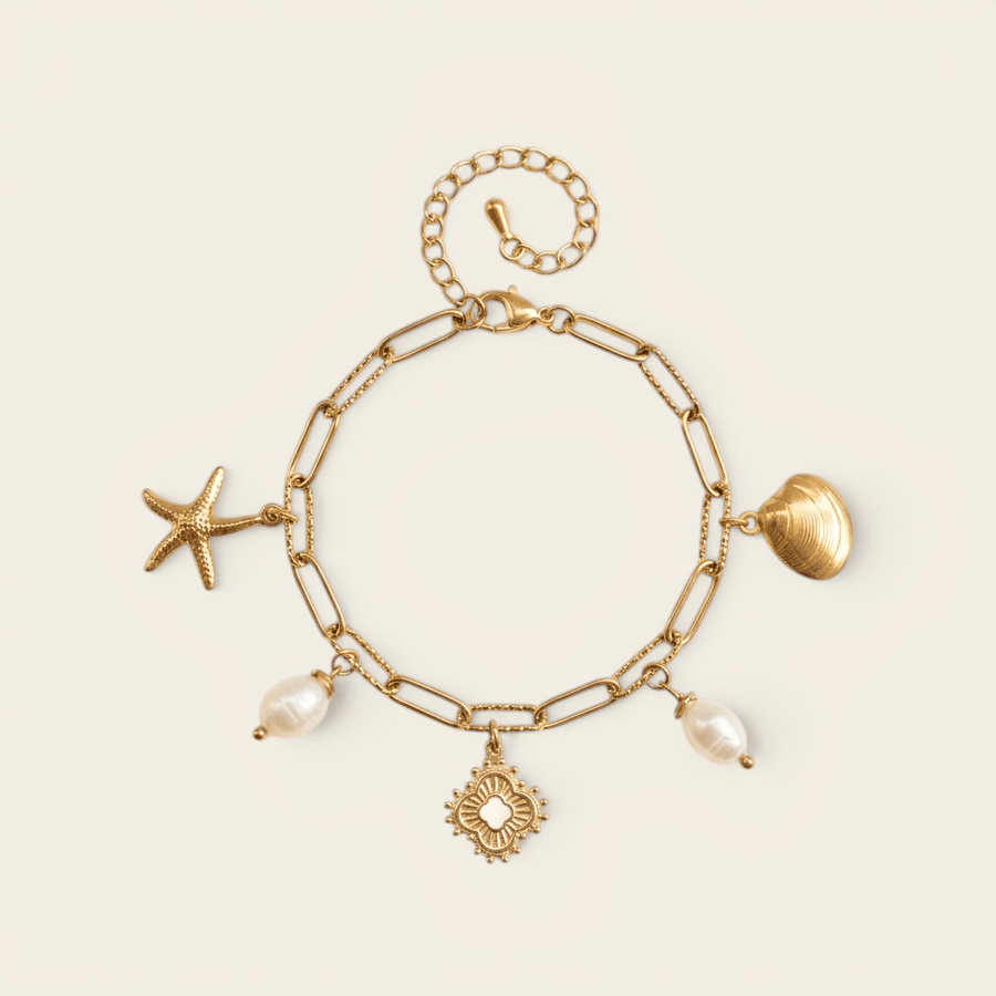Bracelet Verika Bijoux Cybèle doré à breloques étoile de mer, coquillage et perles